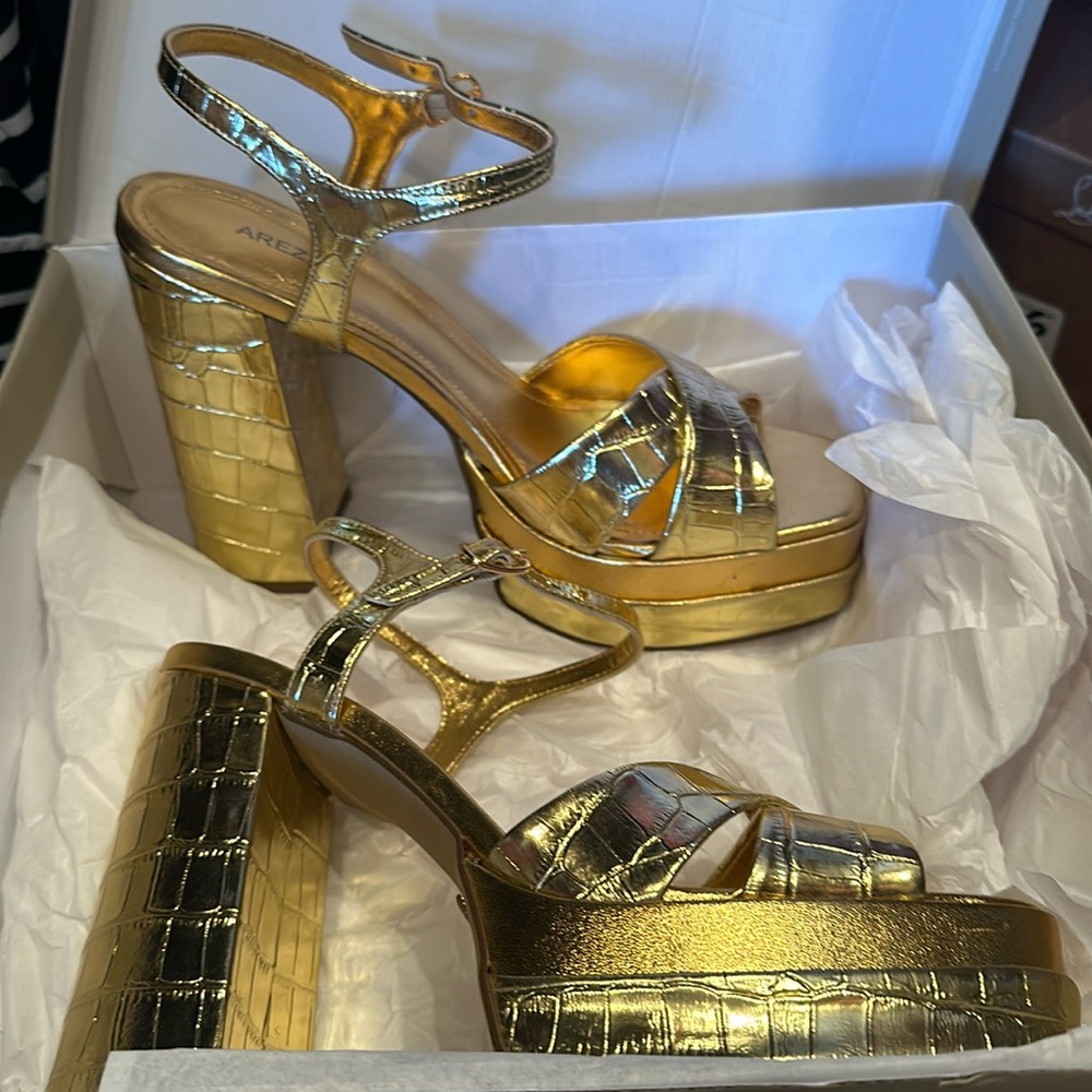 Never been worn/brand new gold platform heels
